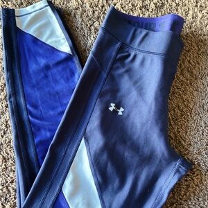 Under Armour Purple and Black Leggings.   Under Armoir black and blue leggings